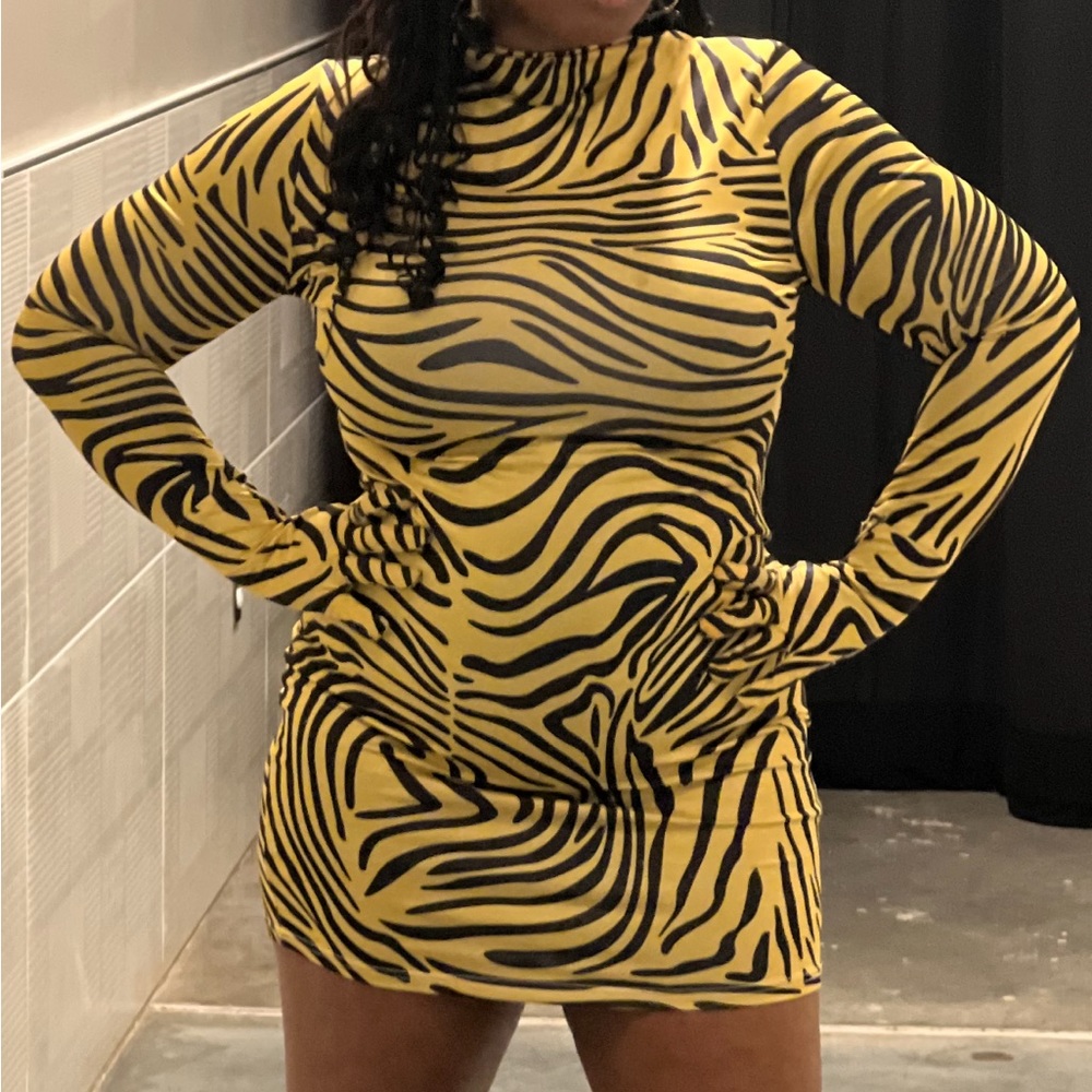 Showstopper gloved dress